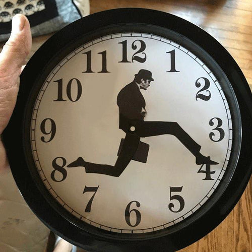 Load image into Gallery viewer, Silly Walk Wall Clock
